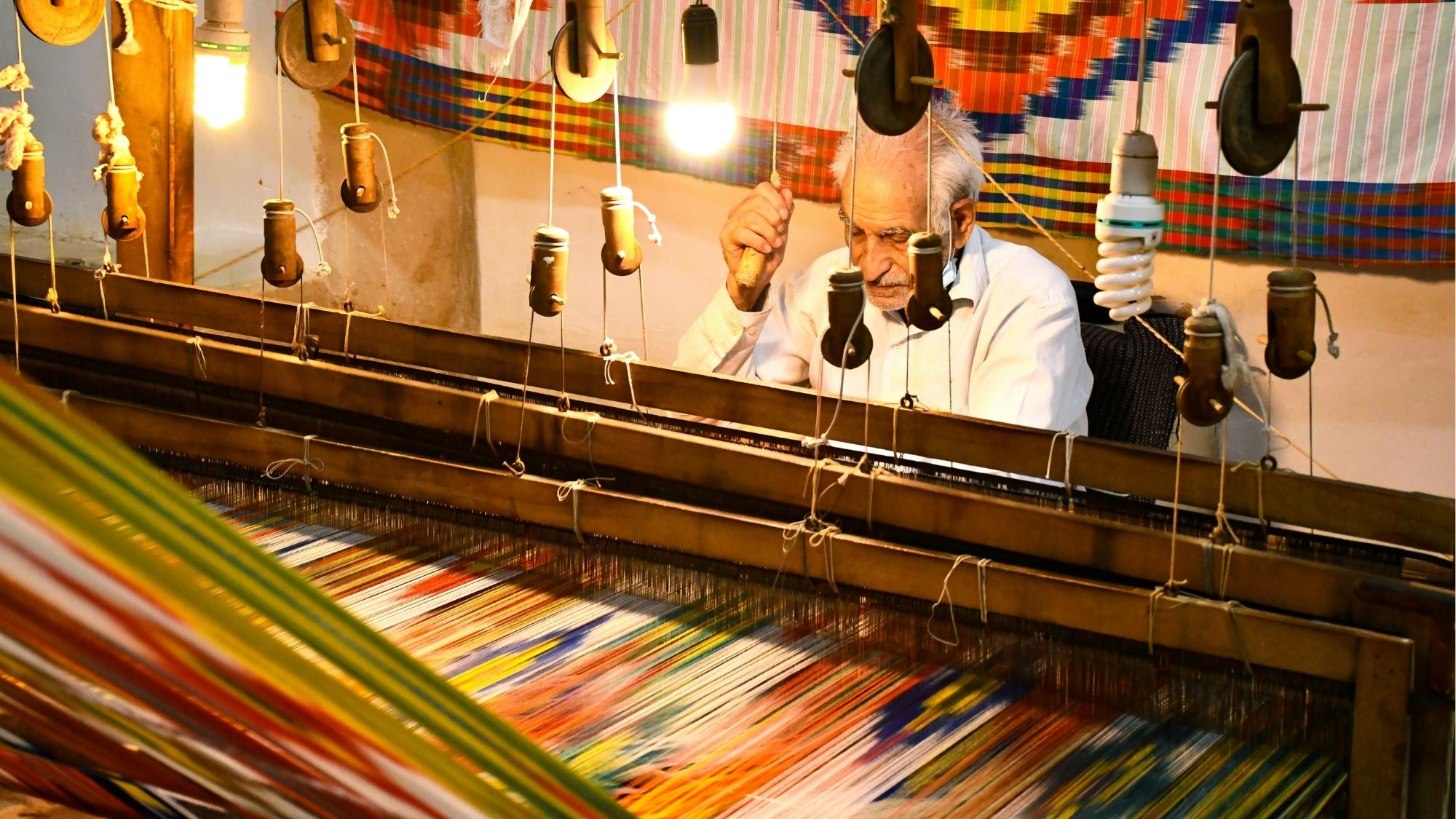 Indian textile manufacturing facility with traditional craftsmanship