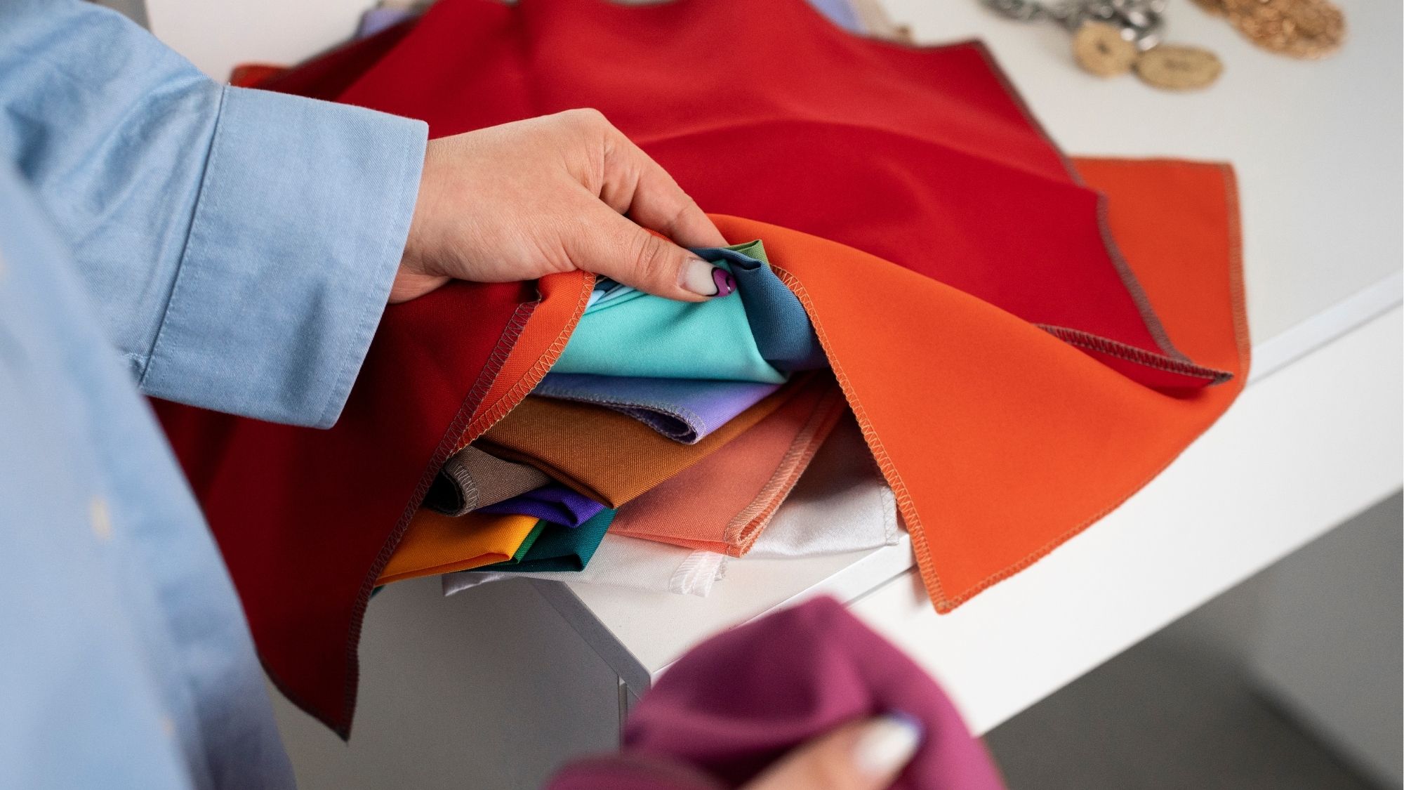 Different types of colorful fabrics and textile materials